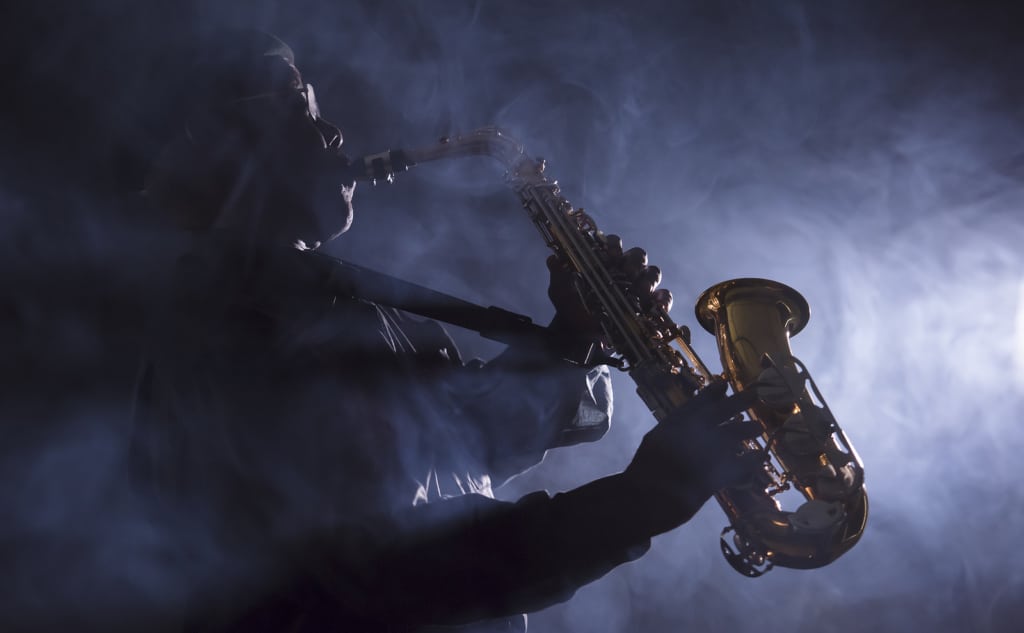 African American jazz musician playing the saxophone